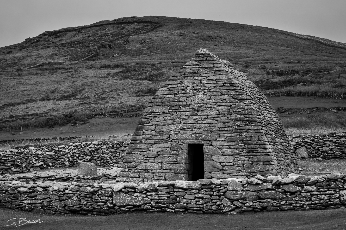 Gallarus Oratory, with Mount Brandon in the background - County Kerry, Ireland